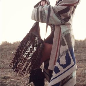 Spell fringe leather purse